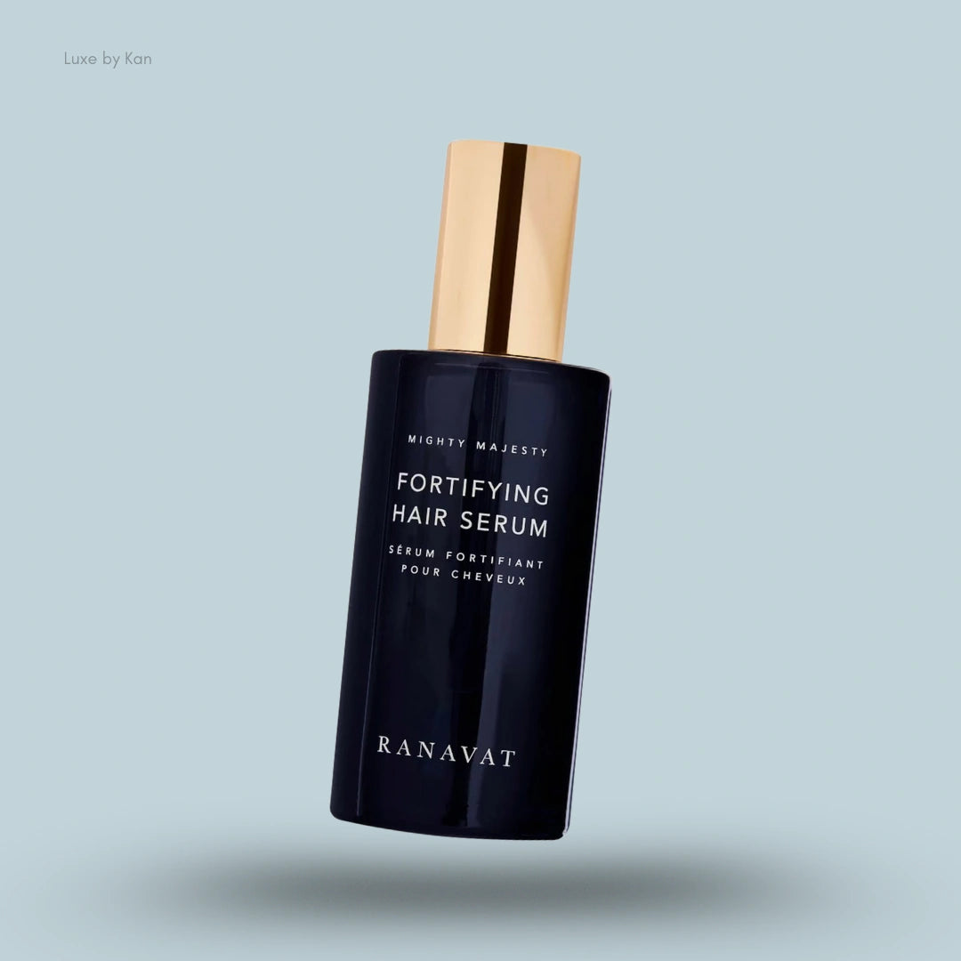 Ranavat Mighty Majesty Fortifying Hair Serum in a black bottle with golden pump.