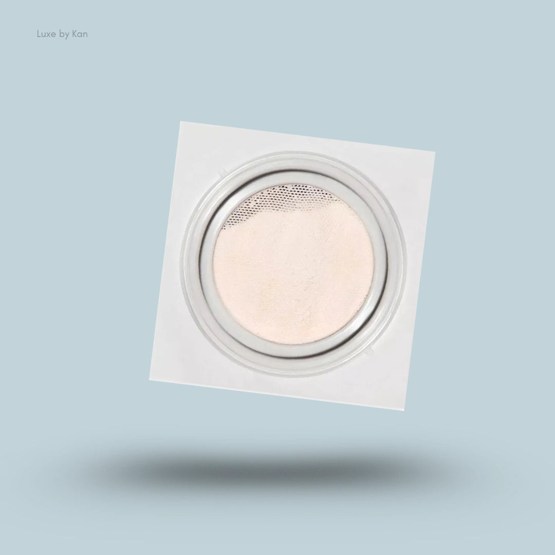 Refy skin finish powder compact with a square white casing.