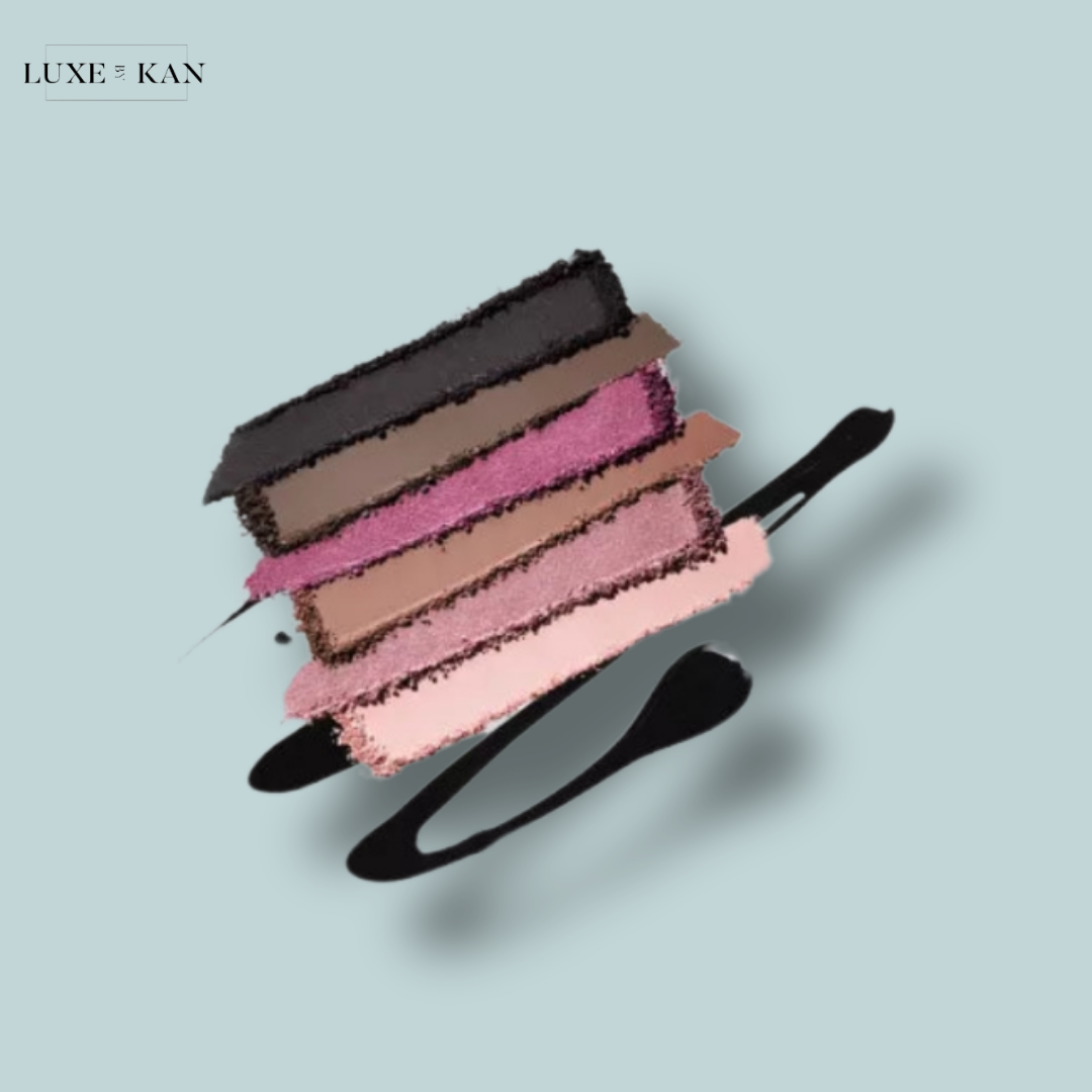 Layers of lipstick shades in various colors from black to pink.