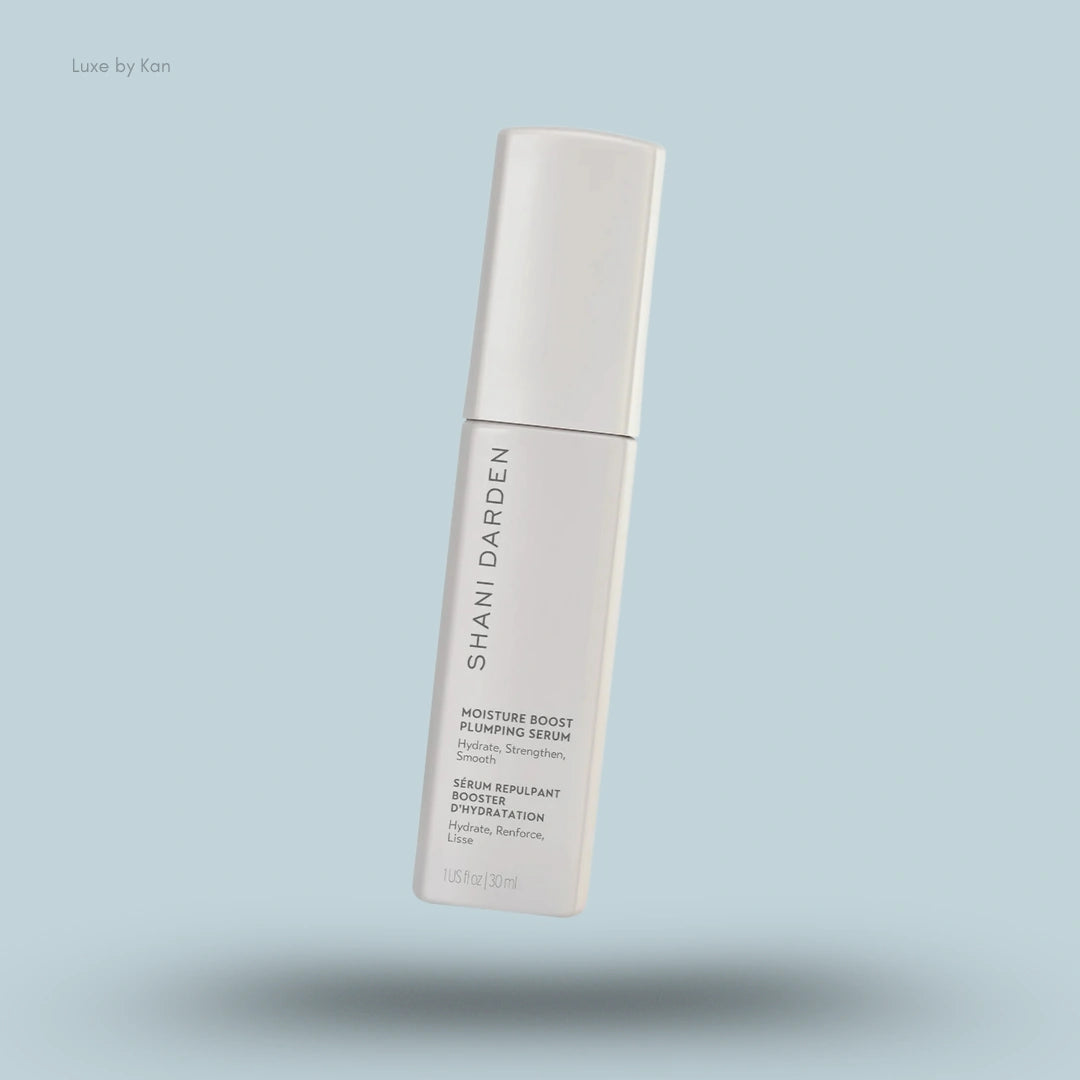 Shani Darden Skin Care Moisture Boost Plumping Serum is in a white container with product details.