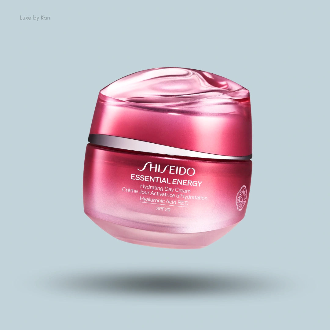 Shiseido Essential Energy Hydrating Day Cream SPF 20, presented in a sculpted pink jar with the product information displayed on the body.