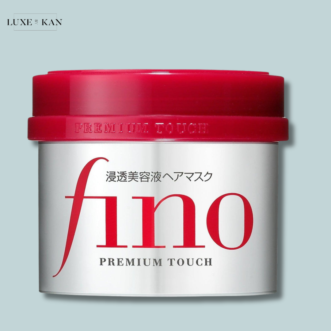 Shiseido fino premium touch hair mask with red lid and white container.