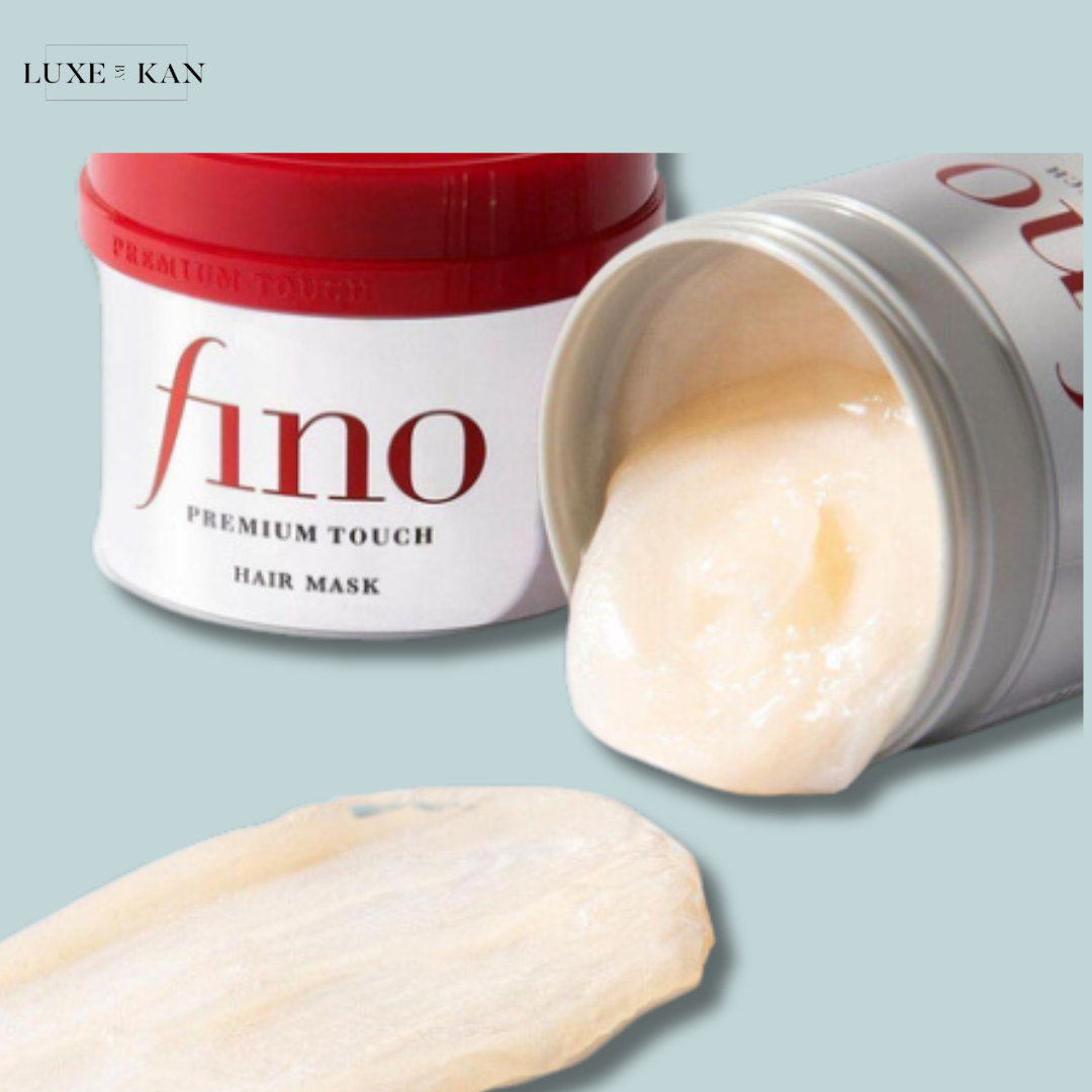 Shiseido Fino Premium Touch Hair Mask container with product spilled out, showcasing its texture.