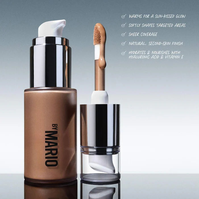 A bottle of By Mario liquid highlighter with a pump and doe-foot applicator, highlighting its sun-kissed glow and hydrating ingredients.