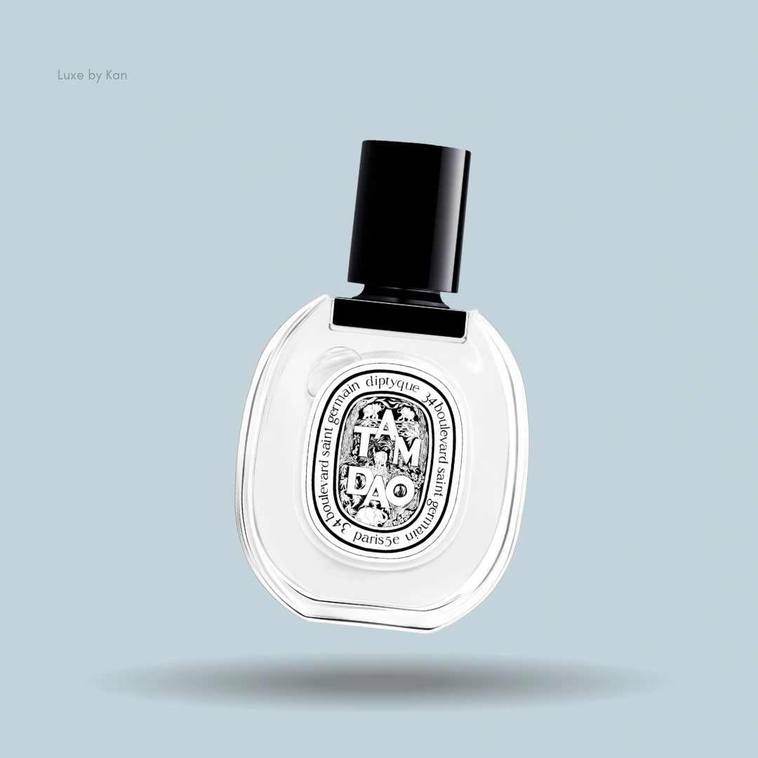 Diptyque Tam Dao Eau de Toilette in a clear bottle with a black cap and circular label.