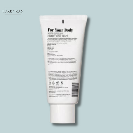 A white tube of body exfoliant labeled "For Your Body" with detailed instructions, set against a light blue background.