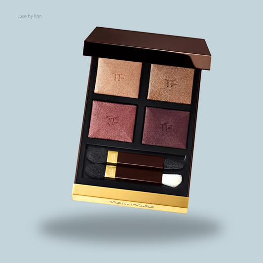 Tom Ford eyeshadow palette featuring four shades: two shimmering and two deep matte, with two applicators included.