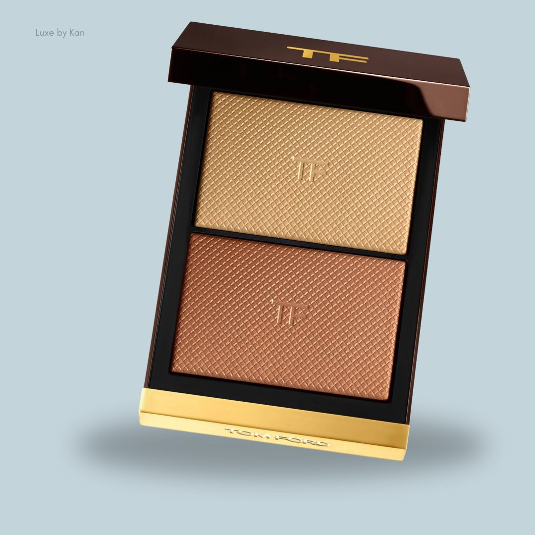 Tom Ford makeup palette featuring two textured bronzer shades: a warm gold and a rich bronze, set in a sleek case.