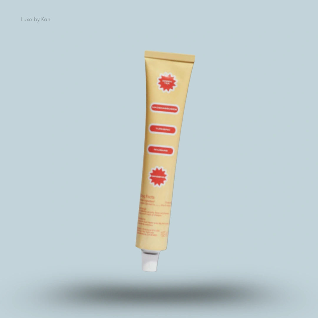 Topicals hydrating moisturizer in a yellow tube with red ingredient labels.
