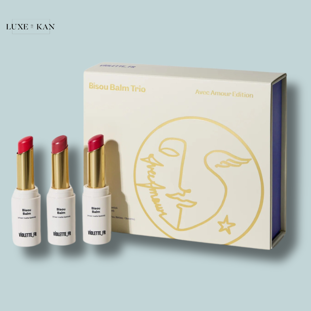 A trio of Bisou Balm Avec Amour Edition lipsticks.