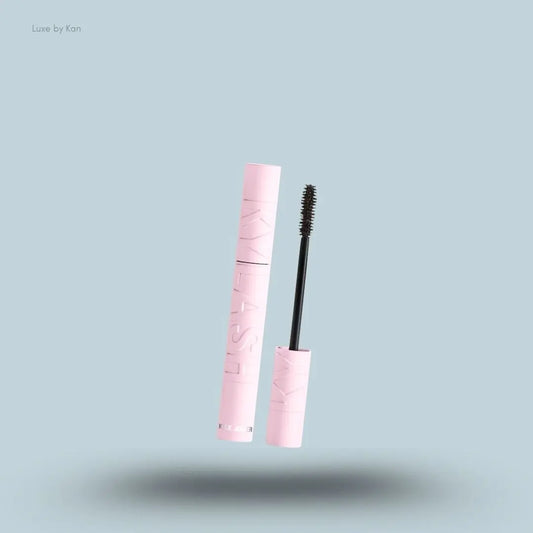 Kylie Cosmetics Kylash Volume Mascara bottle on blue background — Luxe by Kan India