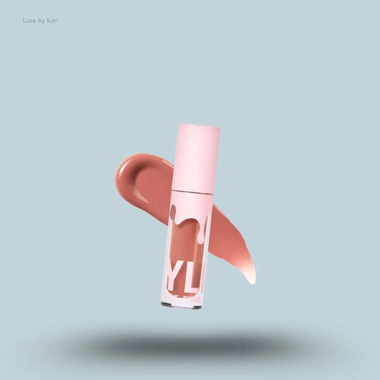 Kylie Cosmetics High Gloss Lip Gloss bottle and swatch on blue background — LBK India