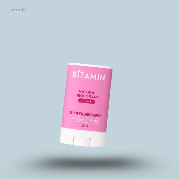 Bitamin Strawberry Teens Natural Deodorant 15g bottle on blue background — Luxe by Kan India
