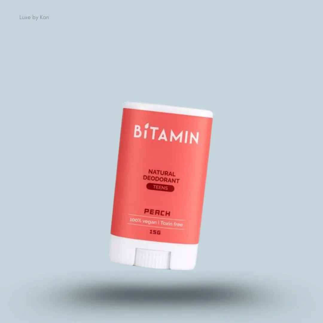 Bitamin Peach Teens Natural Deodorant 15g bottle on blue background — Luxe by Kan India