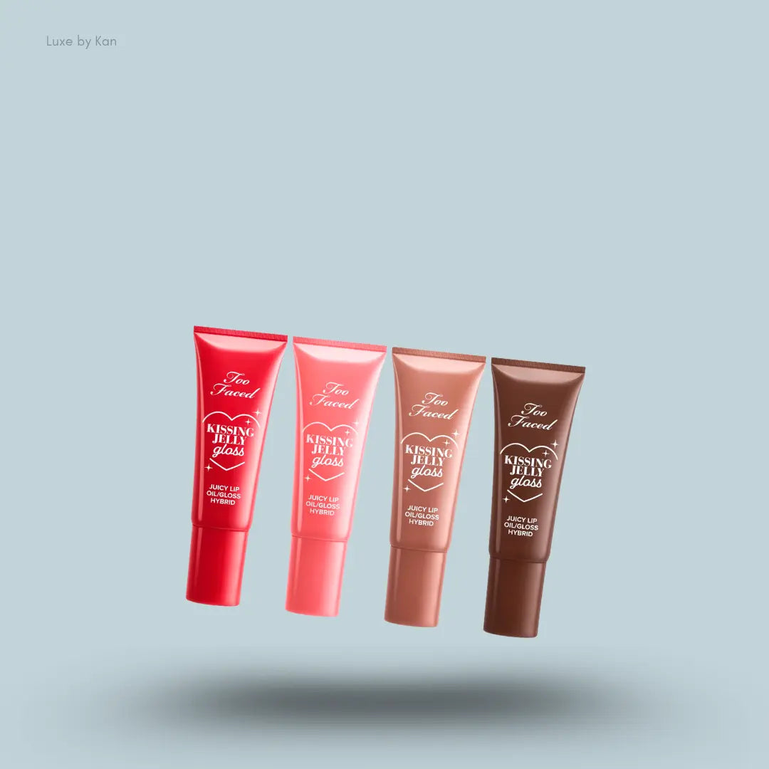 Too Faced Kissing Jelly Set four lip gloss tubes on blue background