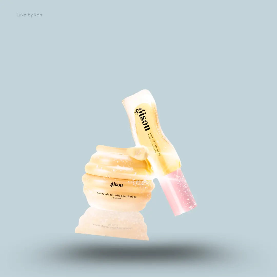 Gisou Lip Therapy Glaze Duo lip oil and lip mask on a blue background