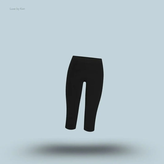 SKIMS Refined Knit Capri in Obsidian, flat lay on light blue background
