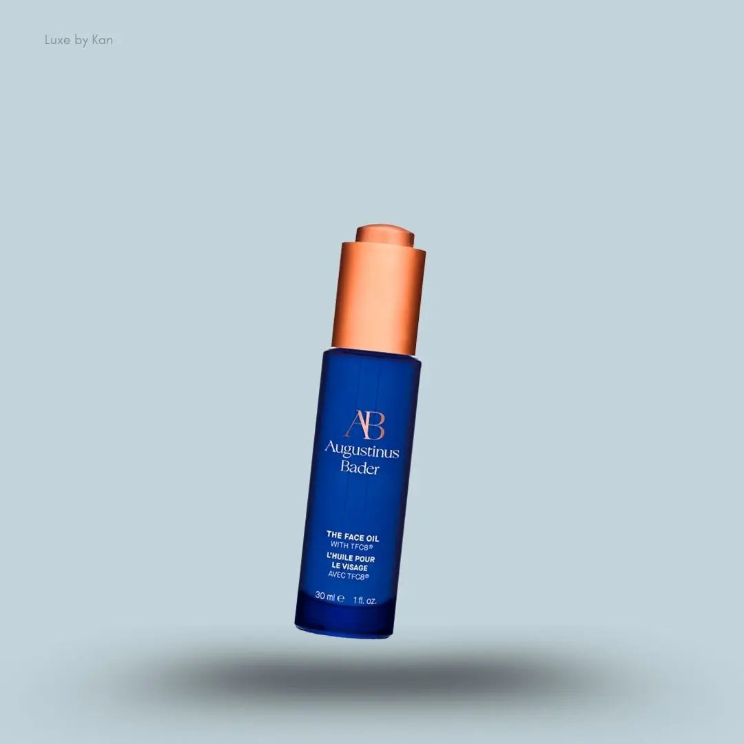 Augustinus Bader The Face Oil 30ml blue bottle with copper cap floating view India