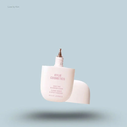 Kylie Cosmetics Skin Tint Blurring Elixir Foundation 30ml bottle on blue background — LBK India