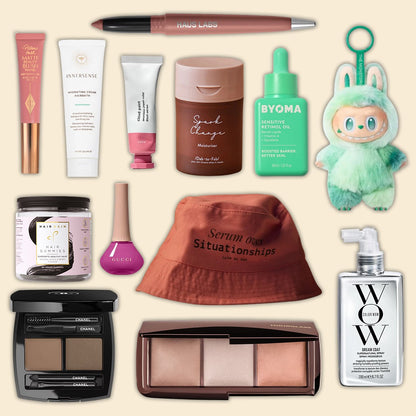 Curated beauty collection including Chanel, Gucci, and Byoma products with a terracotta bucket hat on a tan background.