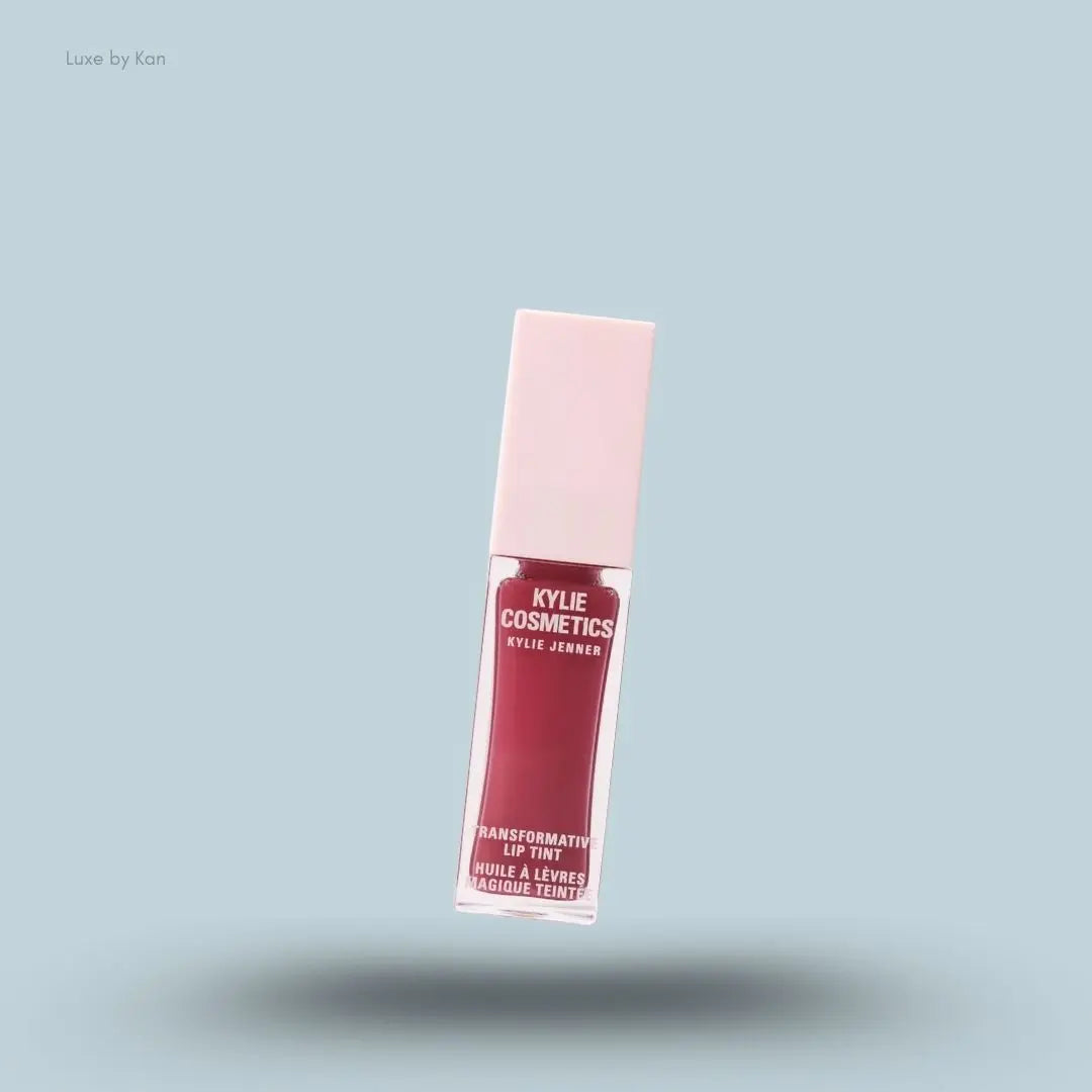 Kylie Cosmetics Transformative Lip Tint 6ml bottle on blue background — LBK