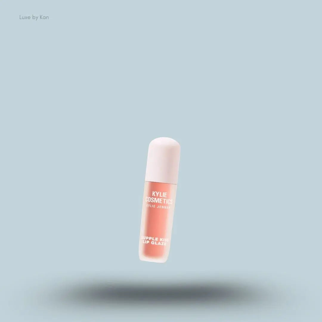 Kylie Cosmetics Supple Kiss Lip Glaze 3ml bottle on blue background — Luxe by Kan India