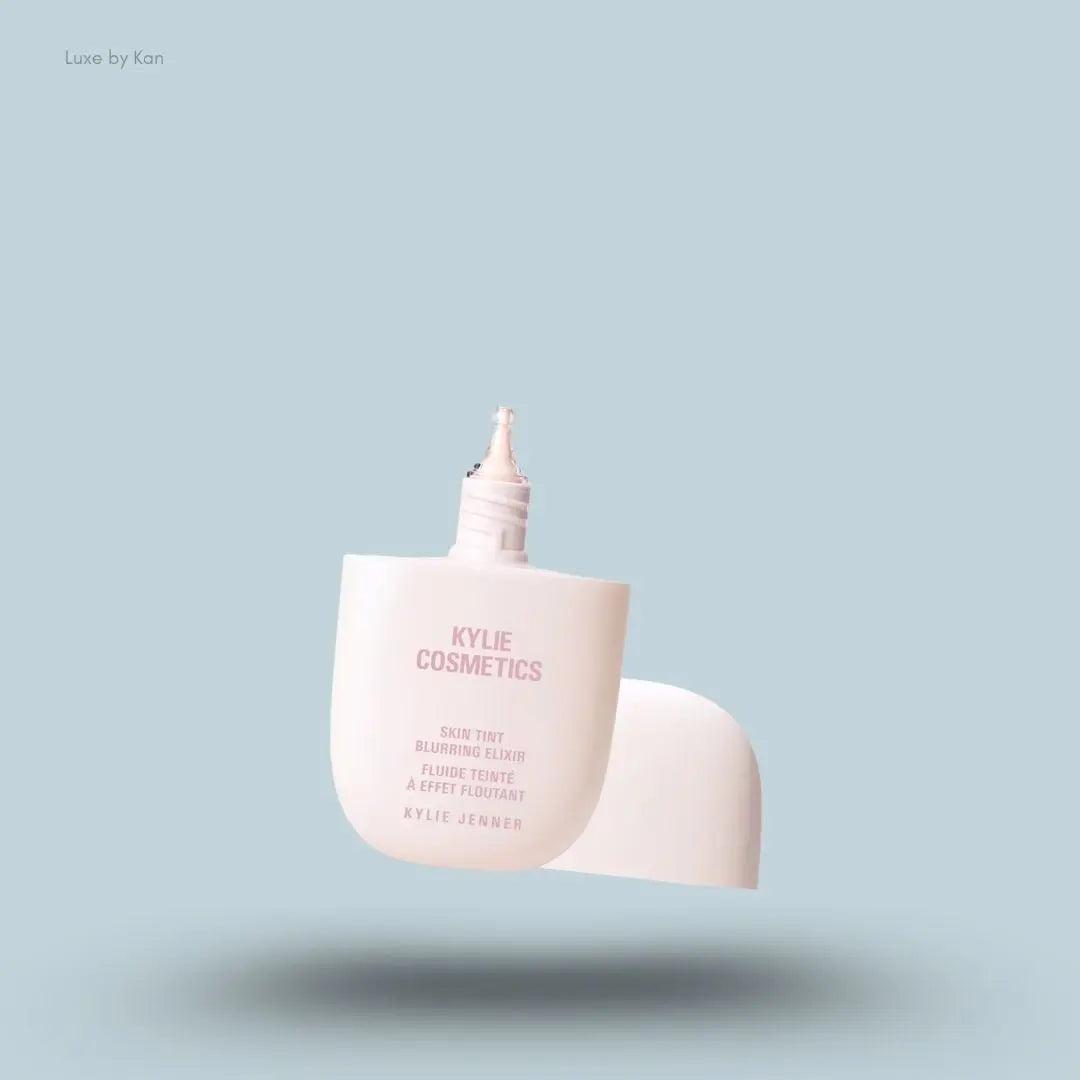 Kylie Cosmetics Skin Tint Blurring Elixir Foundation 30ml bottle on blue background — LBK India