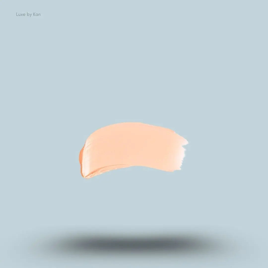 Armani Beauty Power Fabric Compact Foundation swatch on blue background — LBK