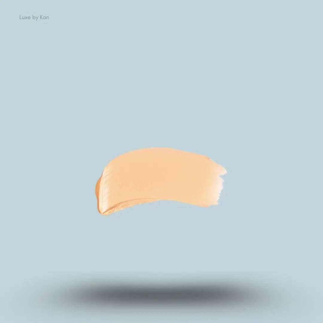 Armani Beauty Power Fabric Compact Foundation swatch on blue background — LBK