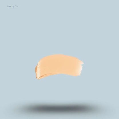 Armani Beauty Power Fabric Compact Foundation swatch on blue background — LBK