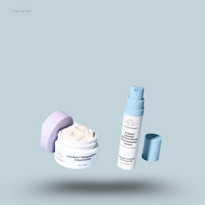 Drunk Elephant Hydrate and Nourish Set two open products on a blue background