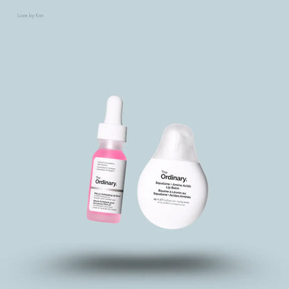 The Ordinary Smooth & Hydrate Lip Duo PHA lip serum and squalane lip balm on blue background