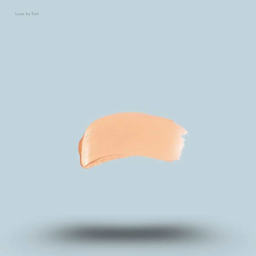 Armani Beauty Power Fabric Compact Foundation swatch on blue background — LBK
