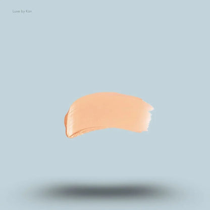 Armani Beauty Power Fabric Compact Foundation swatch on blue background — LBK