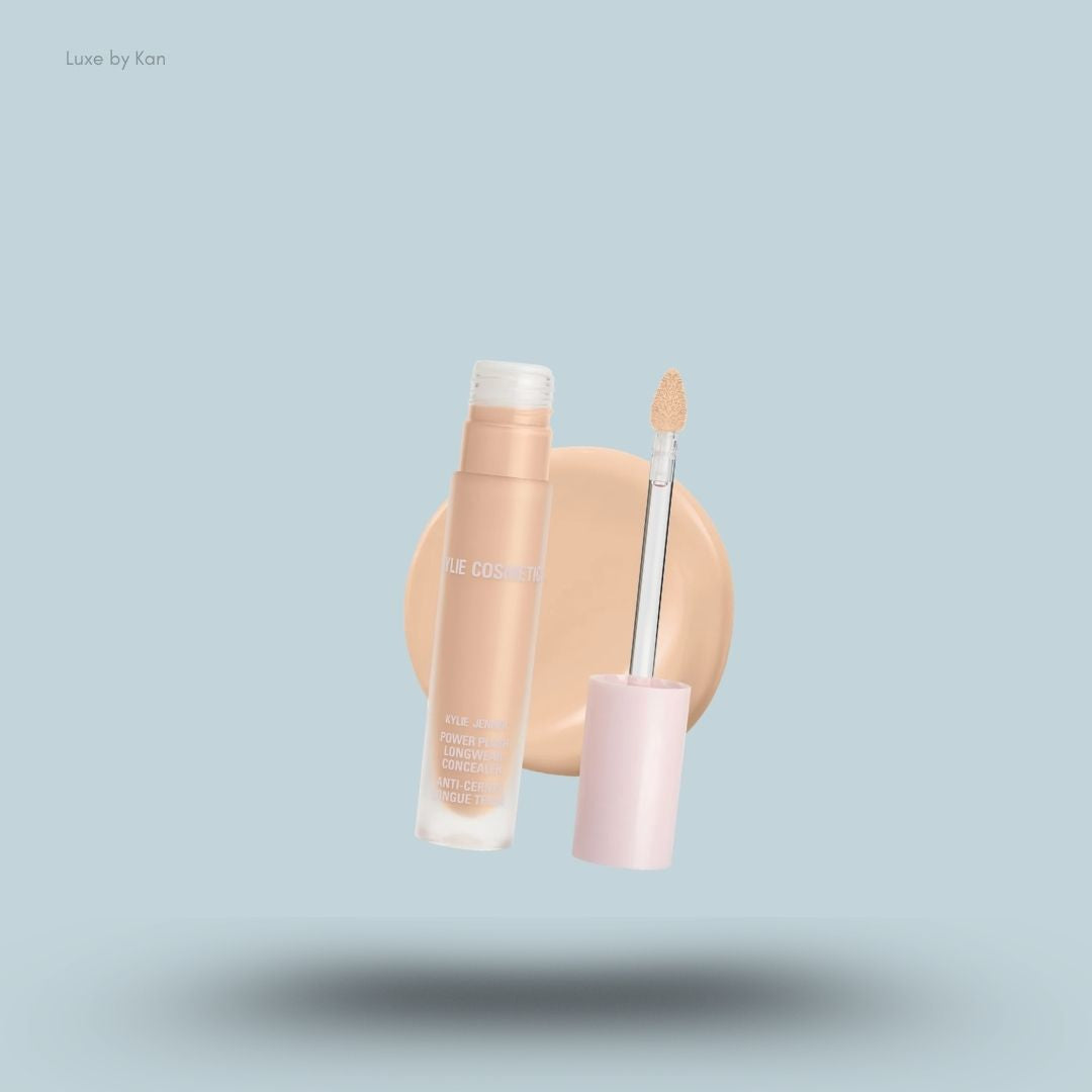 Kylie Cosmetics Power Plush Longwear Concealer bottle and swatch on blue background — LBK India
