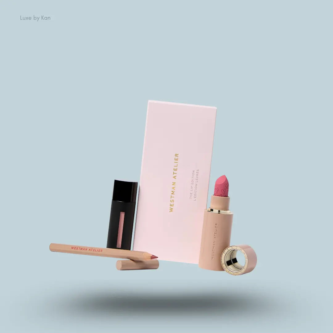 Westman Atelier The Lip Edition three lip products with packaging on blue background