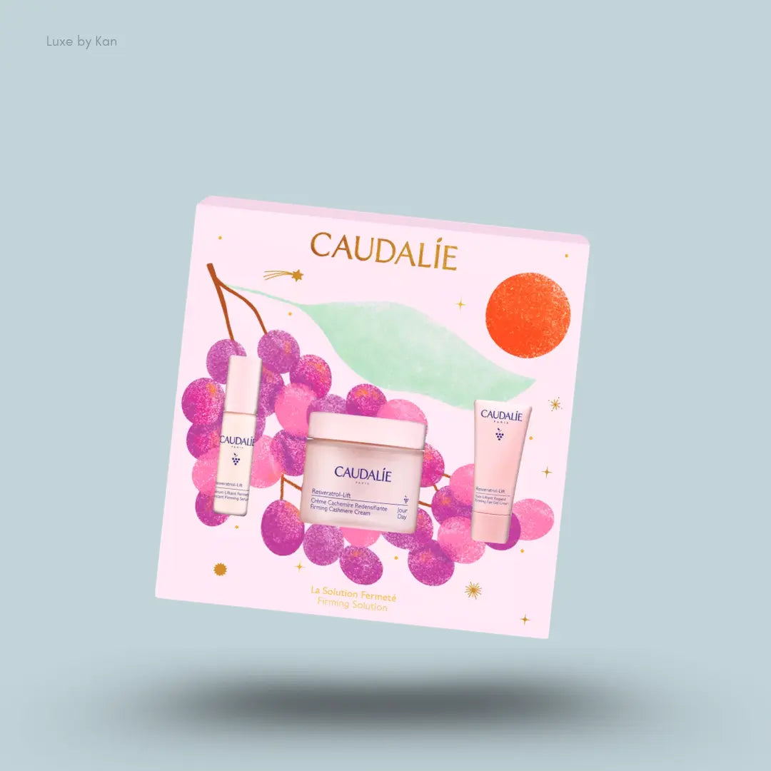 Caudalie Resveratrol-Lift Firming Solution Set with cream, serum, eye cream and pink packaging