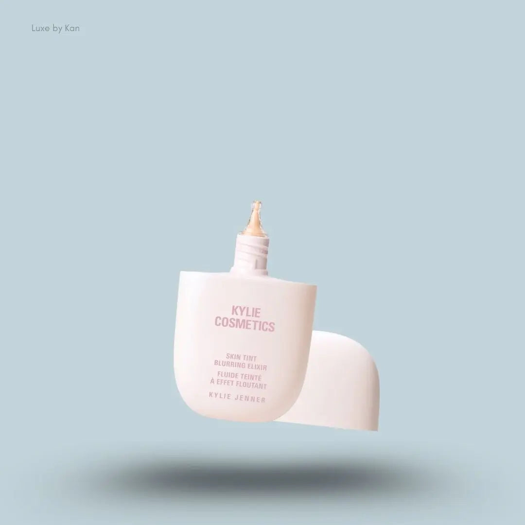 Kylie Cosmetics Skin Tint Blurring Elixir Foundation 30ml bottle on blue background — LBK India