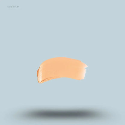 Armani Beauty Power Fabric Compact Foundation swatch on blue background — LBK