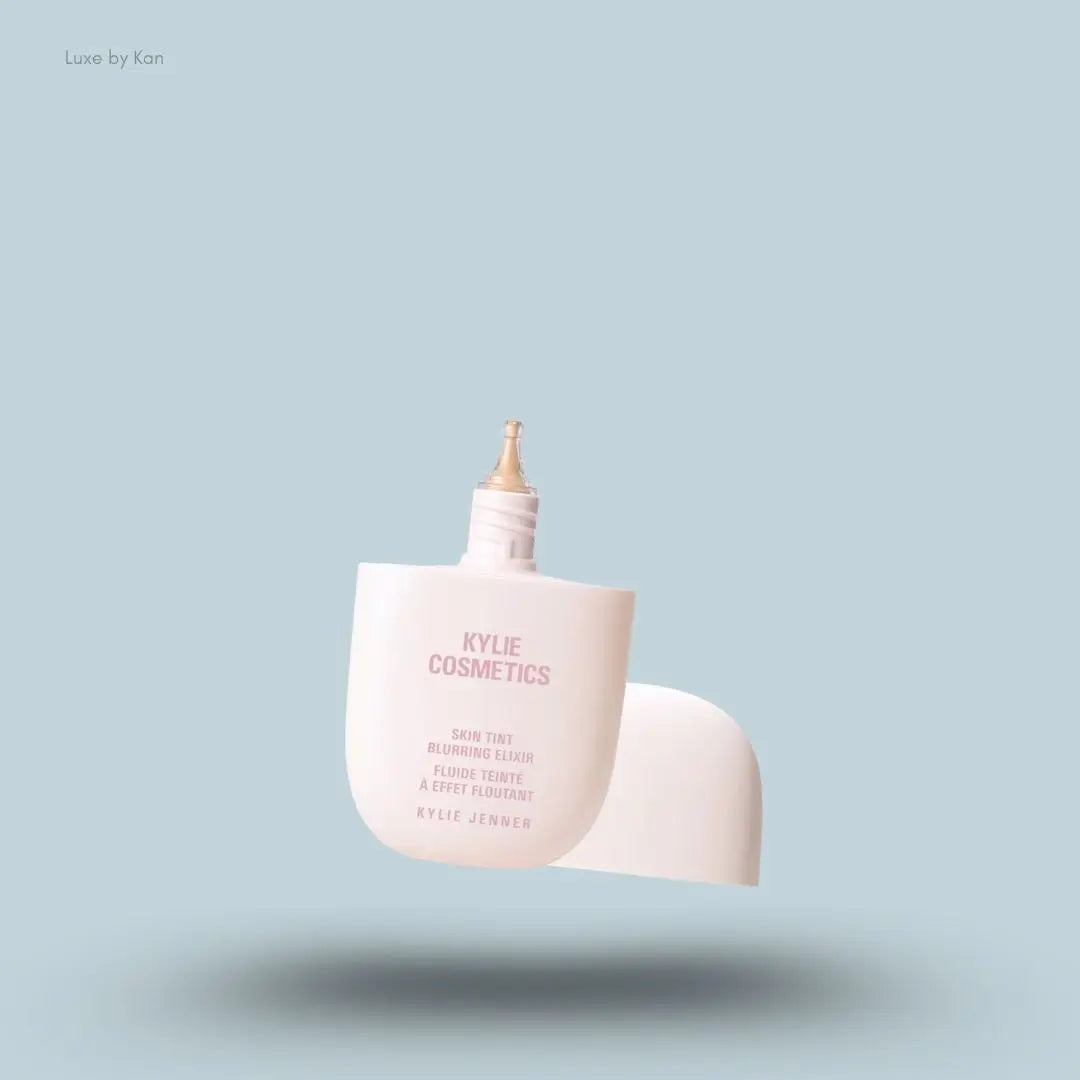 Kylie Cosmetics Skin Tint Blurring Elixir Foundation 30ml bottle on blue background — LBK India