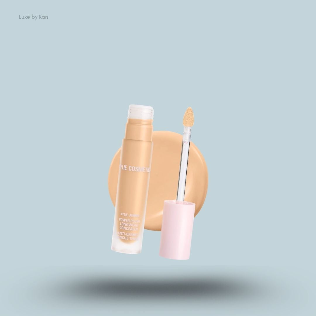 Kylie Cosmetics Power Plush Longwear Concealer bottle and swatch on blue background — LBK India