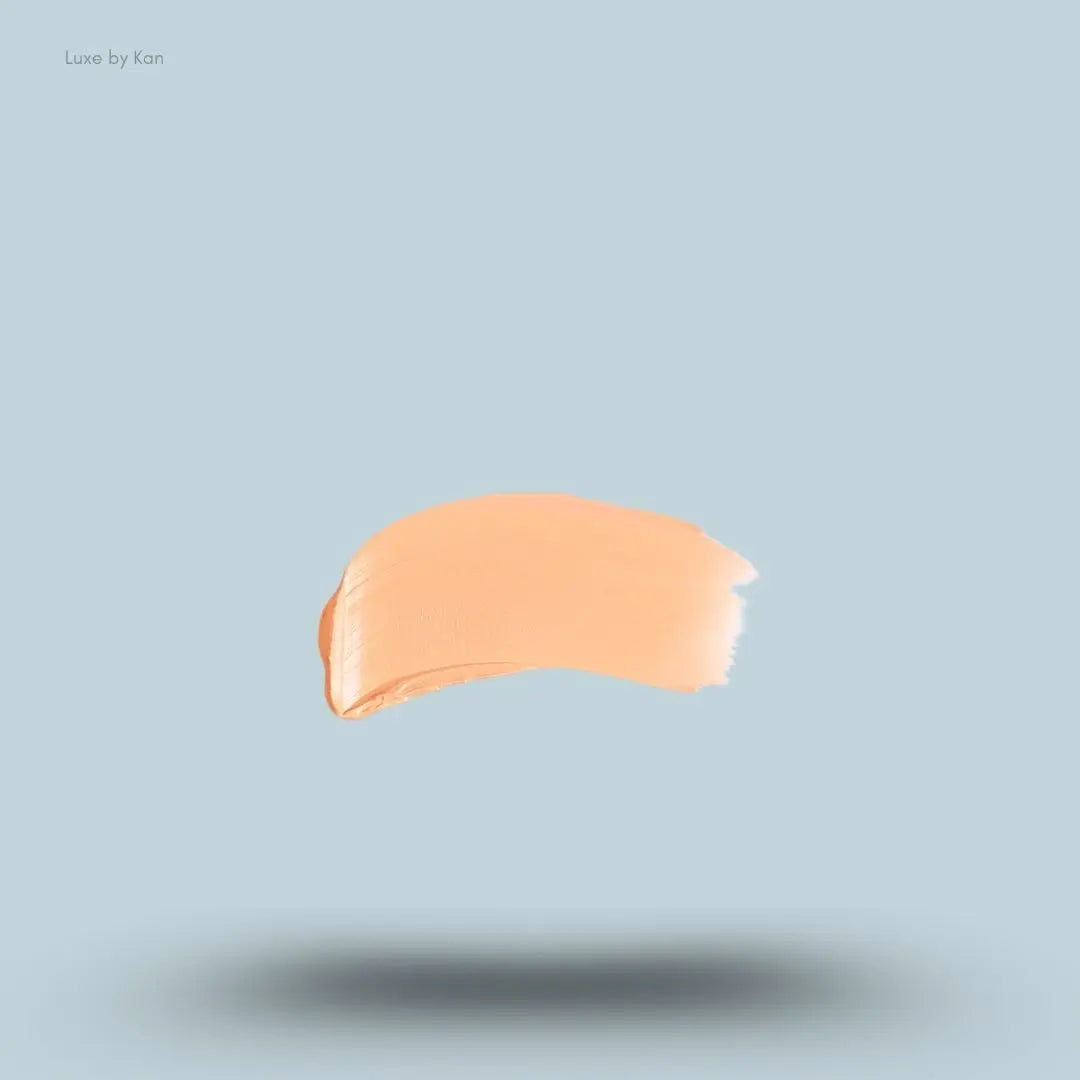 Armani Beauty Power Fabric Compact Foundation swatch on blue background — LBK