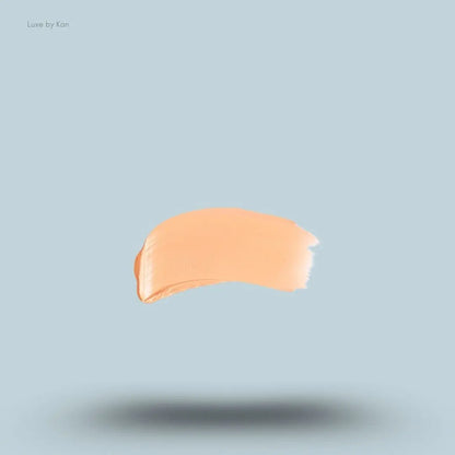 Armani Beauty Power Fabric Compact Foundation swatch on blue background — LBK