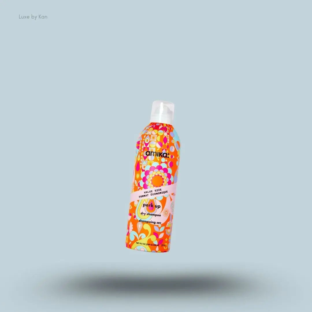  Amika Perk Up Dry Shampoo bottle on blue background — Luxe by Kan India