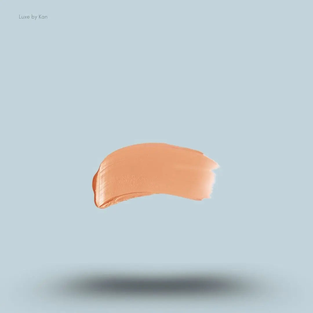 Armani Beauty Power Fabric Compact Foundation swatch on blue background — LBK