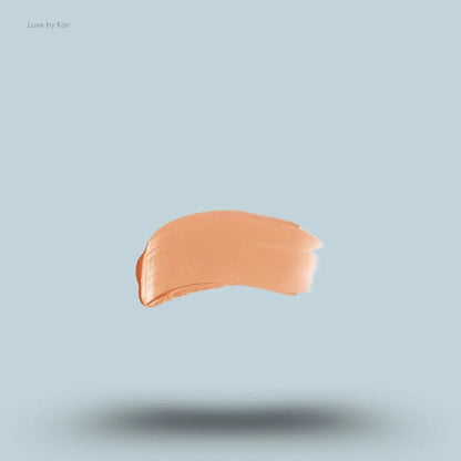 Armani Beauty Power Fabric Compact Foundation swatch on blue background — LBK