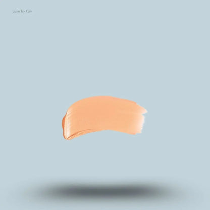 Armani Beauty Power Fabric Compact Foundation swatch on blue background — LBK