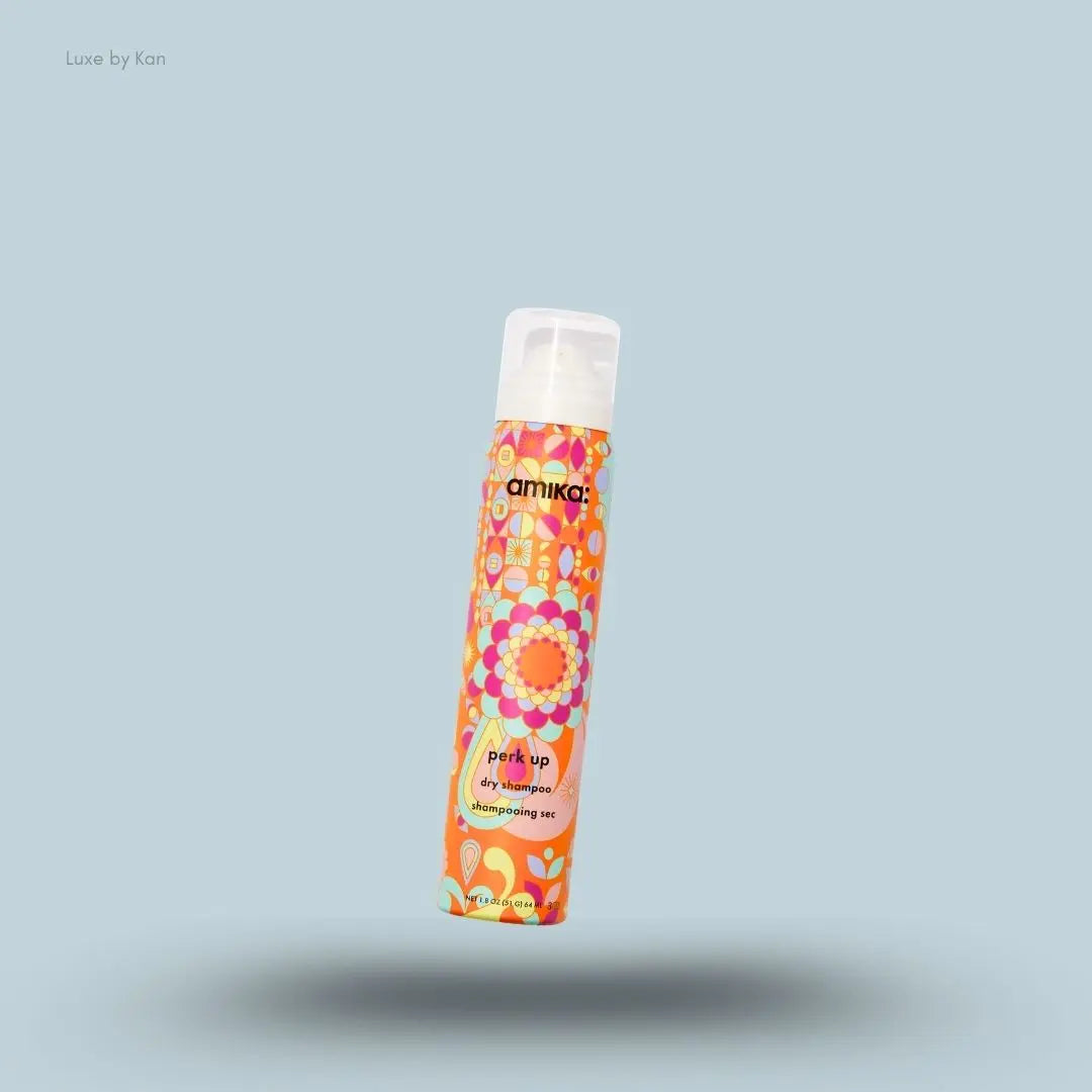  Amika Perk Up Dry Shampoo bottle on blue background — Luxe by Kan India