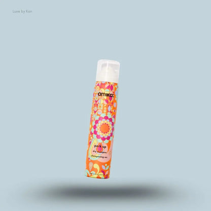  Amika Perk Up Dry Shampoo bottle on blue background — Luxe by Kan India