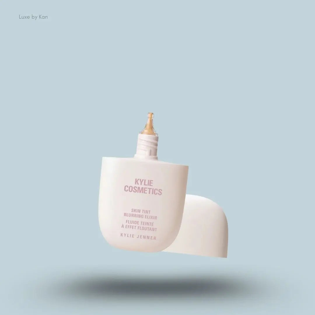 Kylie Cosmetics Skin Tint Blurring Elixir Foundation 30ml bottle on blue background — LBK India